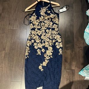 Elegant navy blue embroidered with gold dress. Size 8